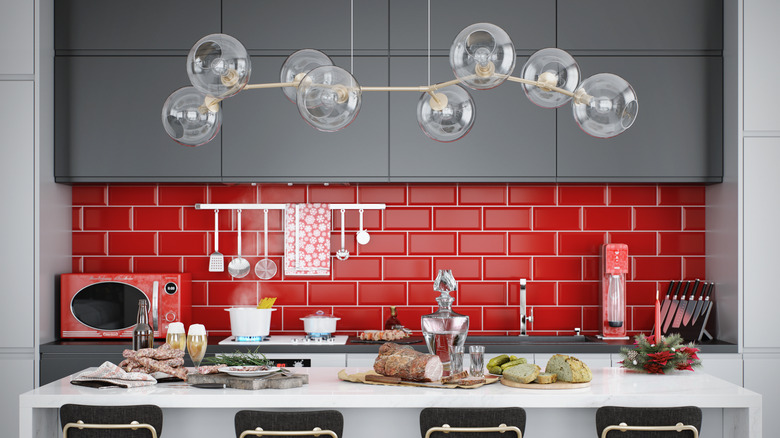 Modern kitchen with red backsplash