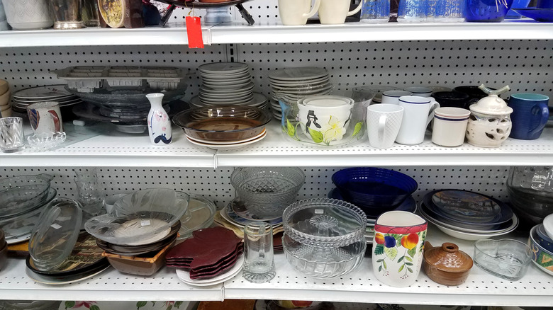 shelves filled with thrift shop items