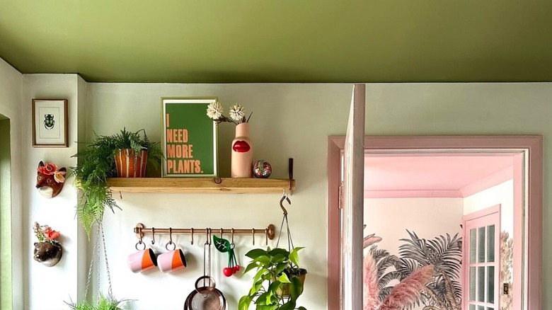 Green color capped room with pink color capped room in the background