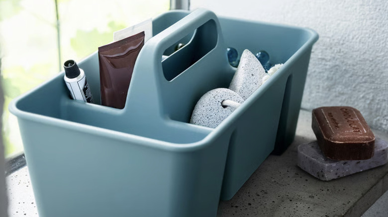 IKEA STACKSTOD organizer filled with bathroom items.