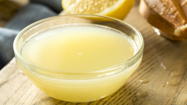 Freshly squeezed lemon juice in bowl to be used for cleaning
