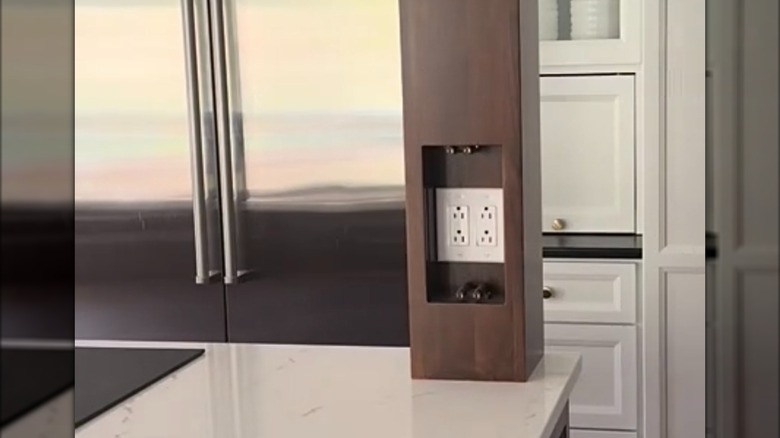 outlets hidden inside column in kitchen