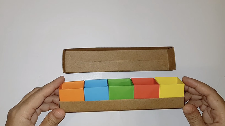 A rainbow origami jewelry box