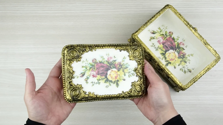 A DIY pink jewelry box with tufted pearl beads