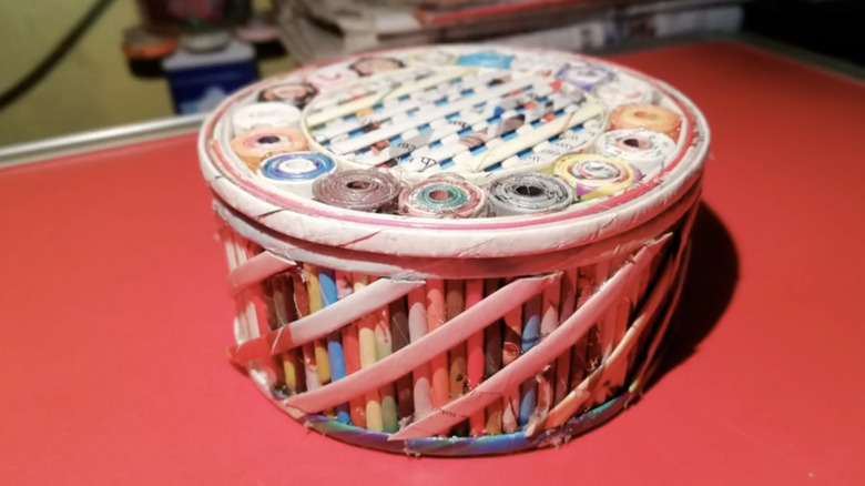 A jewelry box made from coiled paper and cardboard