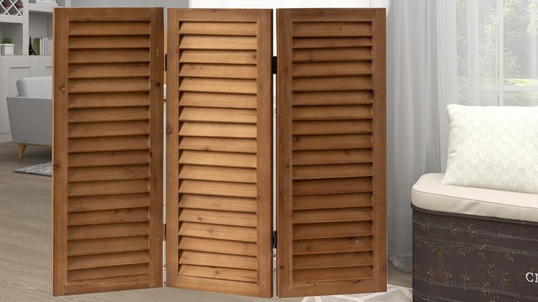 Short shutter-style privacy screen in a wood finish