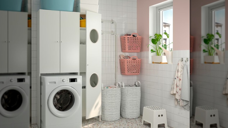 The IKEA NYSJÖN collection cabinet in a laundry room.