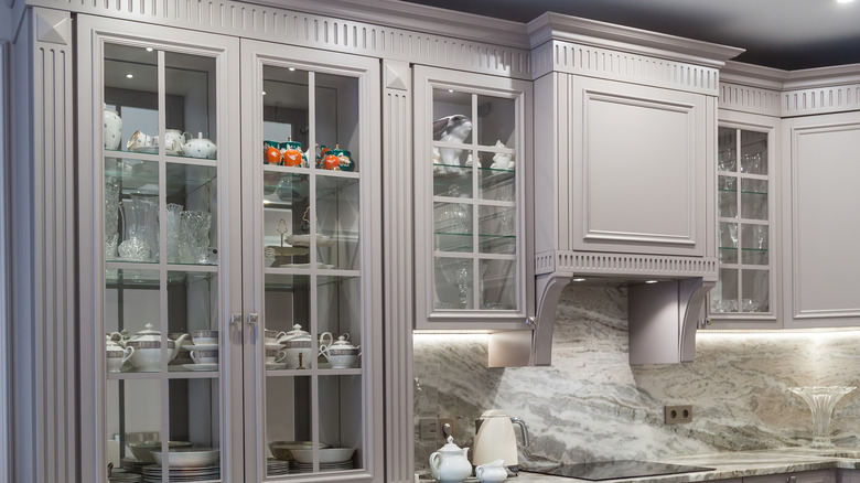 Kitchen with glass-fronted cabinet doors