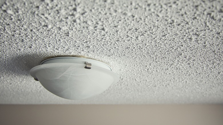 Popcorn ceiling with a light fixture