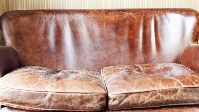 Old, worn leather couch