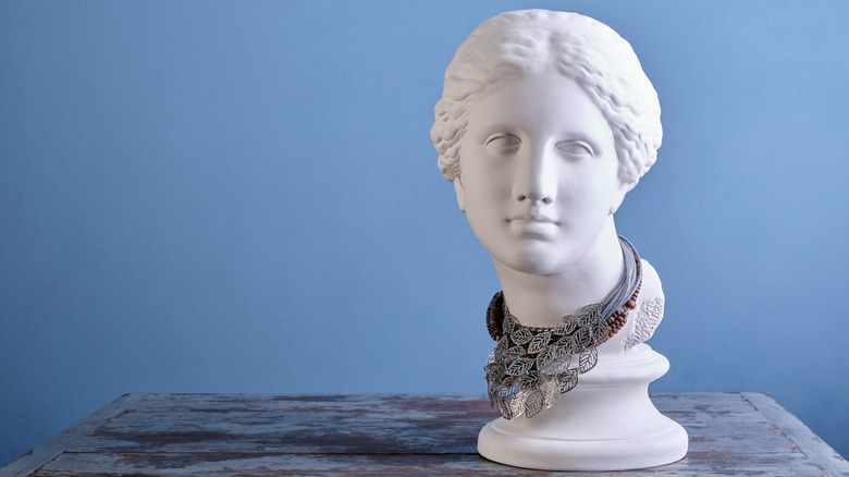 Antique bust with a statement necklace