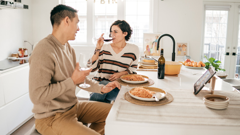 couple eating at kitchen island
