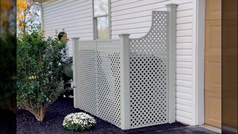 lattice privacy fence for trash can corral