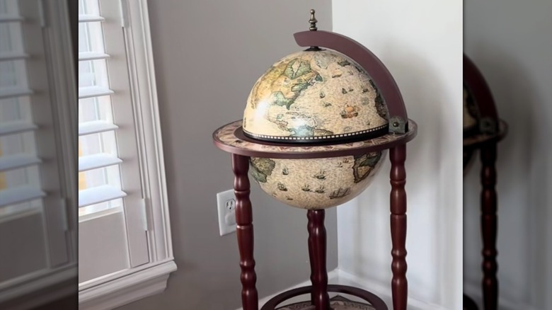 Vintage globe bar in living room corner