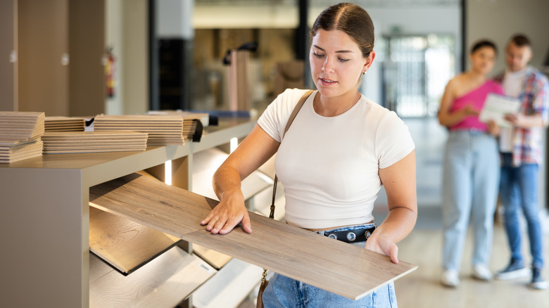 person shopping for wood flooring