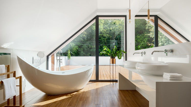 An elegant, modern attic bathroom