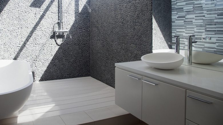 A bathroom featuring a wet room