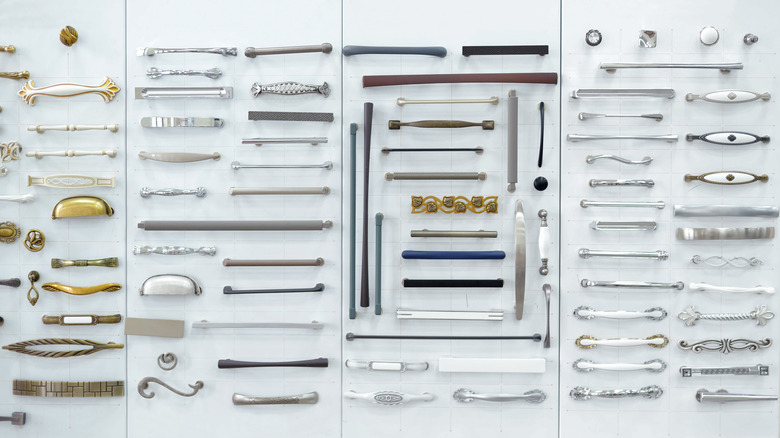 Display with various styles of cabinet pulls