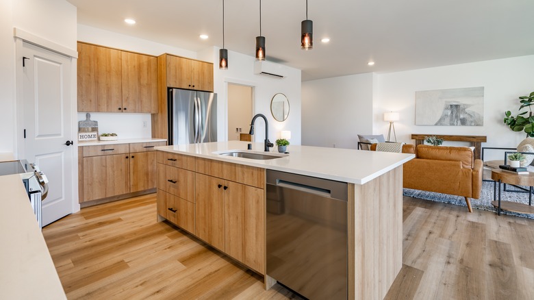 Bright kitchen light wood floor and cabinets