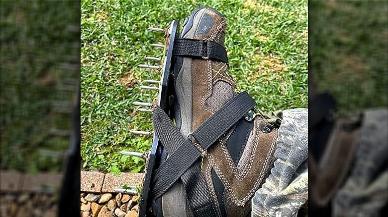 Customer photo of aerator shoe strapped onto hiking boots
