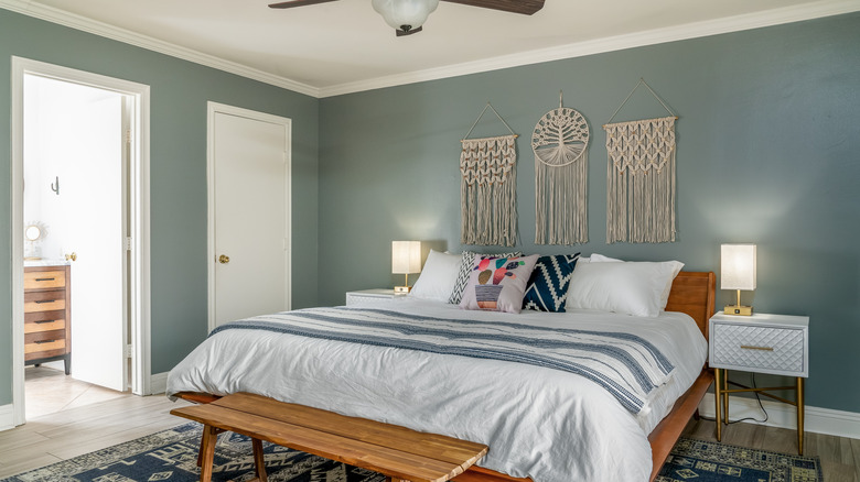 Bedroom with slate blue walls.