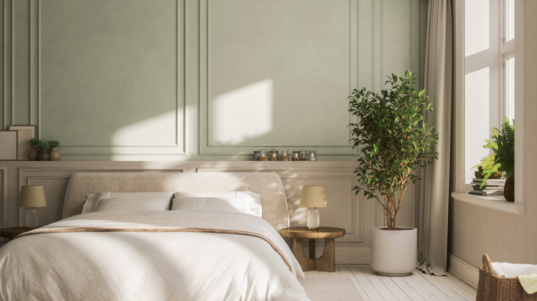 Bedroom with pale neutral walls.