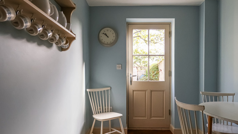 Entryway painted pale blue.