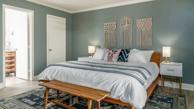 Bedroom with slate blue walls.