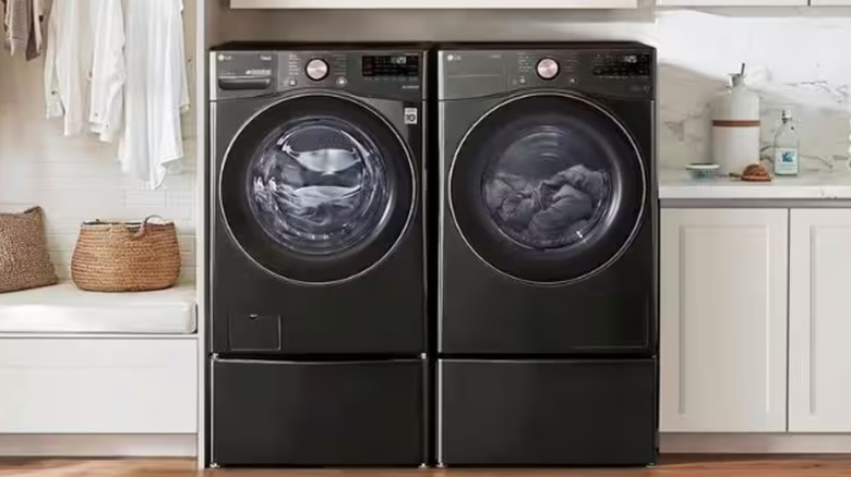 An LG washer and dryer in a tidy home laundry room