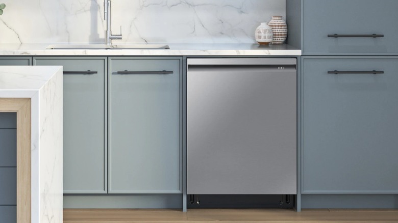 A stainless steel dishwasher installed in a kitchen