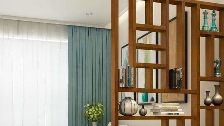 Partition wall with shelves