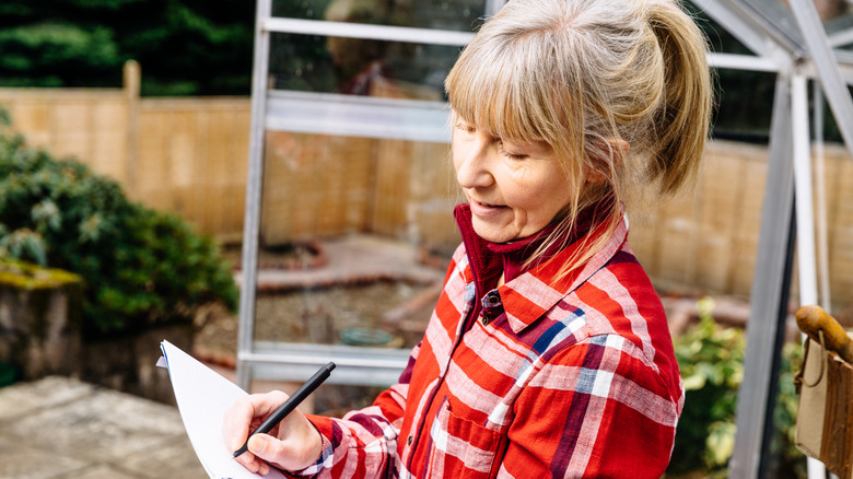 Gardener planning what to plant in the spring