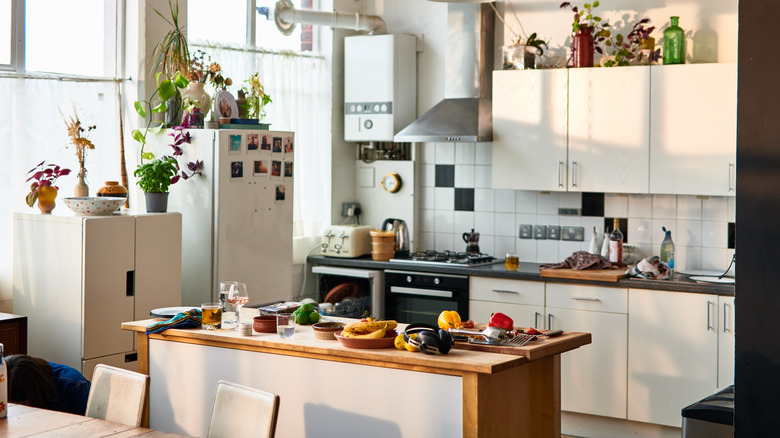 A modern kitchen space with a tile backsplash