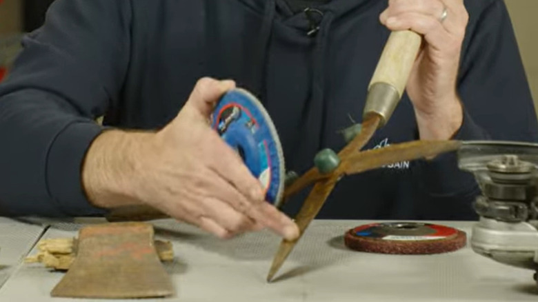 Video demonstrator showing how to angle grinder blade against dull blade for sharpening