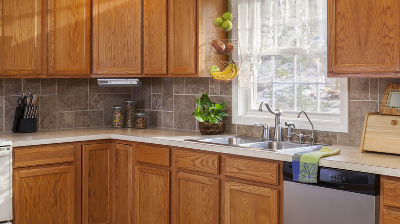 kitchen with honey-toned wood cabinets