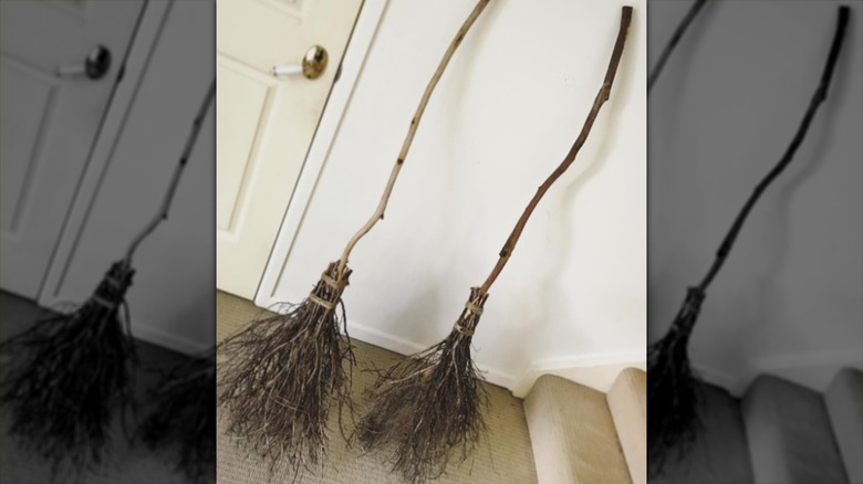 Tree-branch broomsticks with twig heads