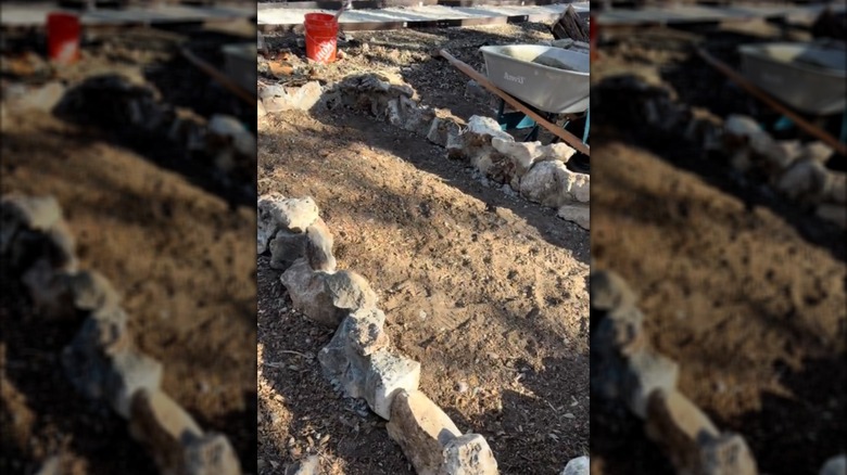 Raised garden beds made with rocks and mortar