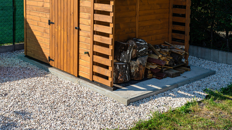 Garden shed with a concrete foundation built on top of a gravel base