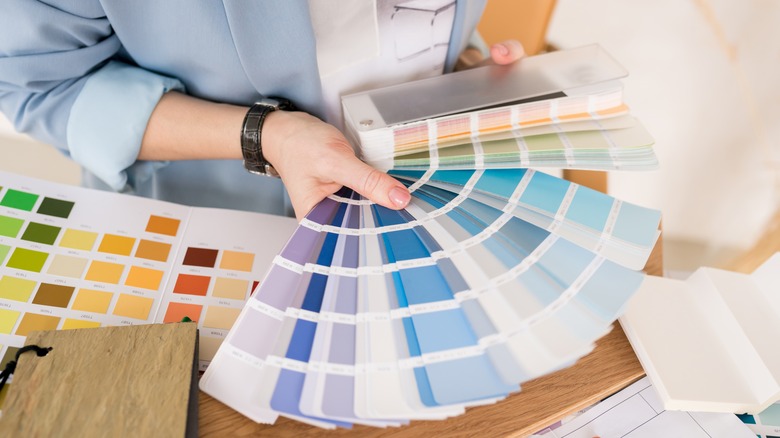 Woman looking at paint samples