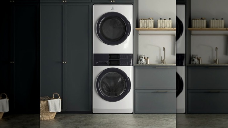 A stackable washer and dryer in a modern laundry room