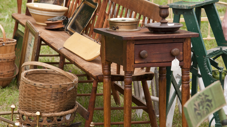 Older wood furniture at a garage sale