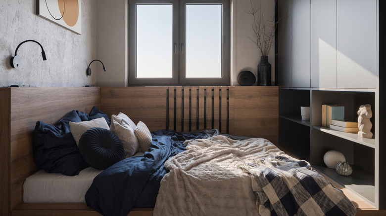A small bedroom with built-in storage.
