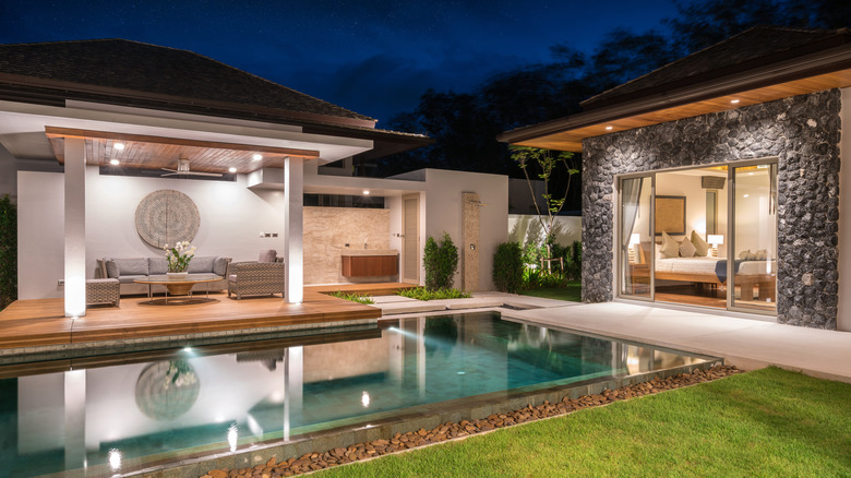 Backyard pool during night 