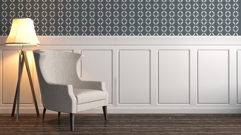 room with chair rail and wallpaper