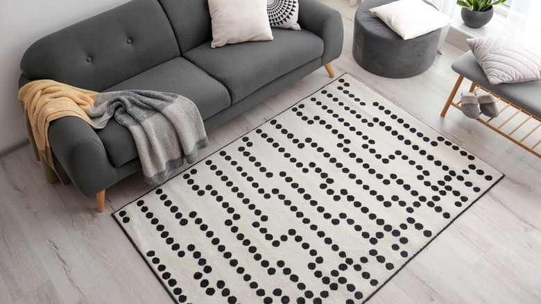 White carpet with black dots