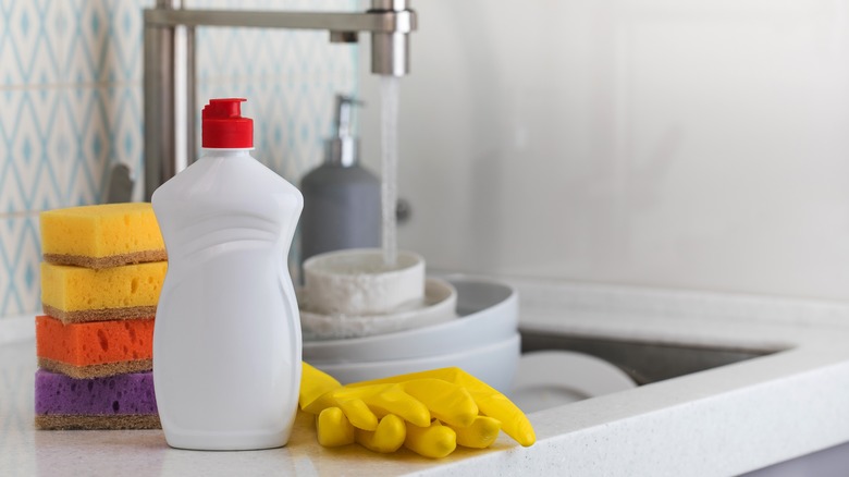 Dish soap next to sink