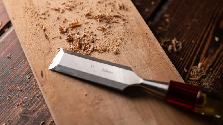 A chisel on a hardwood