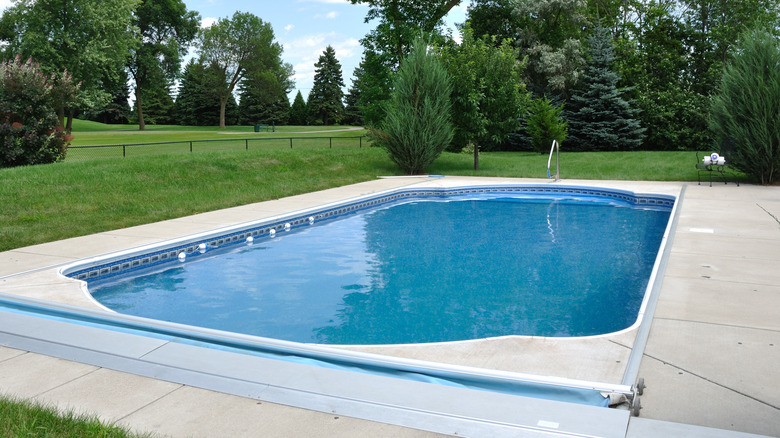 Inground pool in backyard