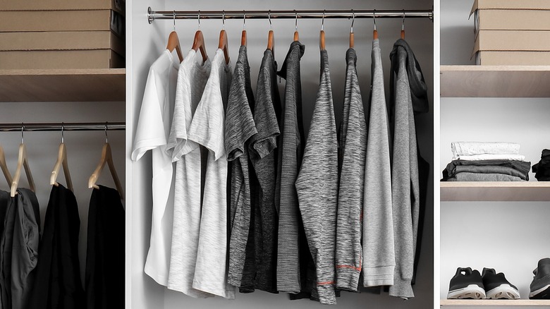 T-shirts hanging in a neatly organized wardrobe