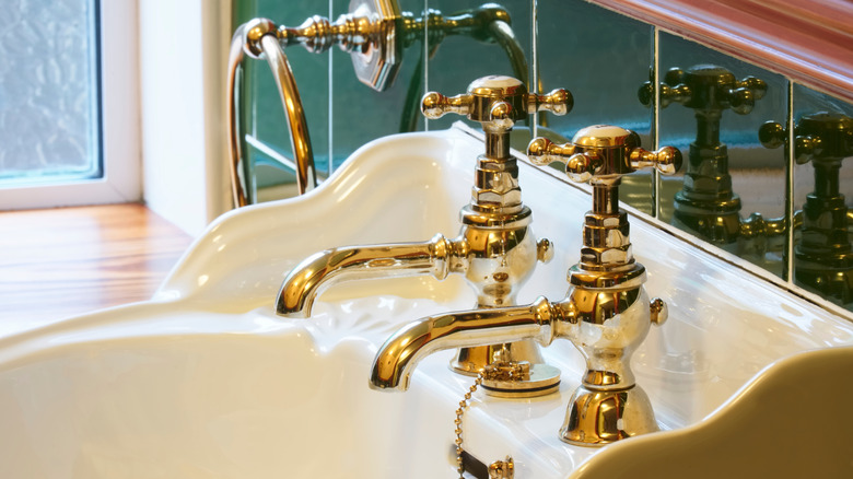 New brass-plated sink taps with an antique look